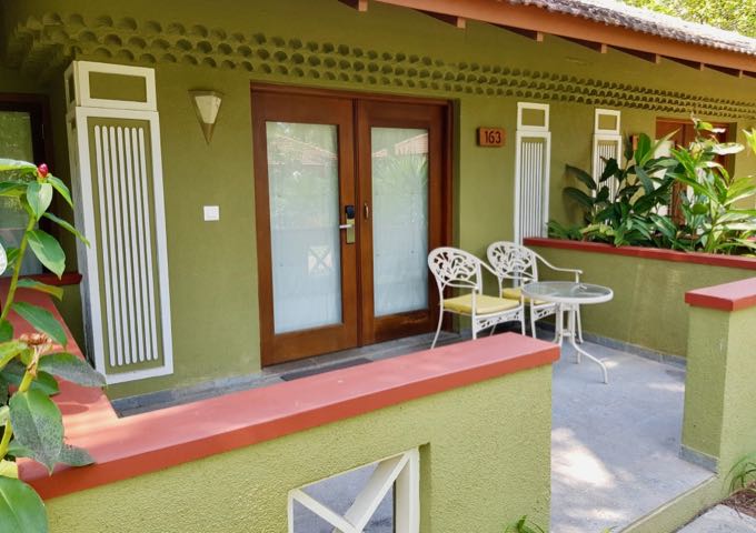 The large balconies/verandas of villas and suites feature outdoor furniture.