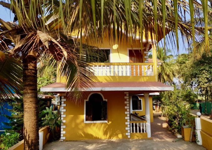 The brightly painted guest house offers a few rooms in a large family home.