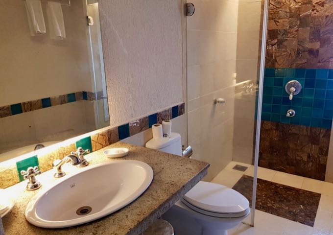 Rooms feature spacious bathrooms.