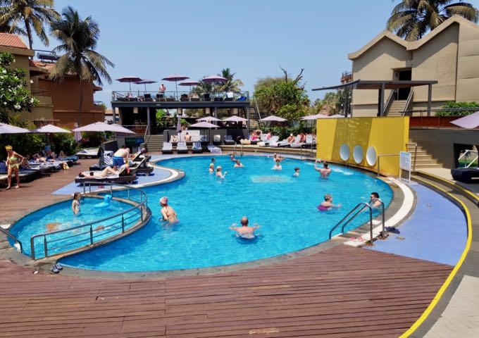 The pool is small compared to the crowds at the resort.