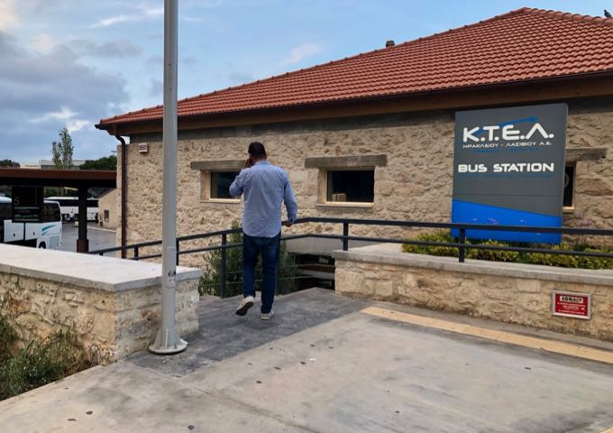 Man walking down the steps into the KTEL bus station A in Heraklion