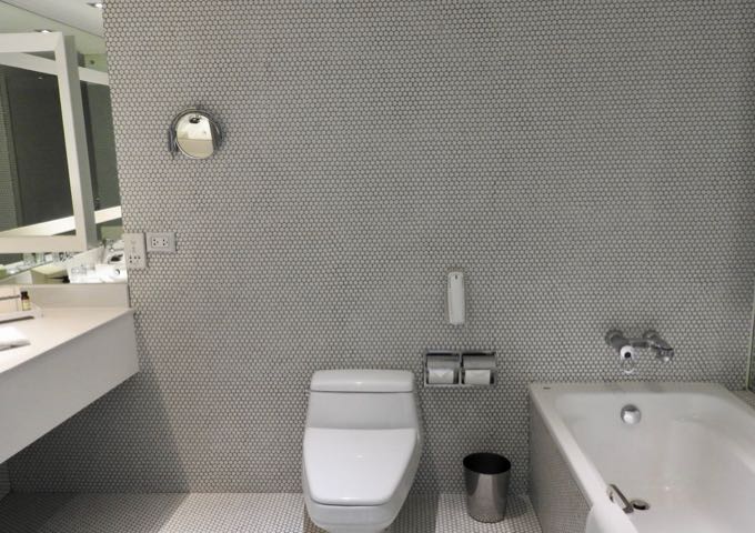 The ensuite bathroom has a bathtub.