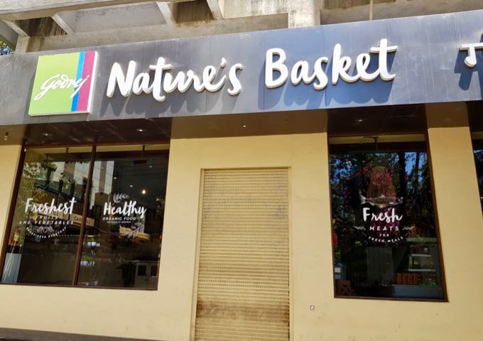 Nature’s Basket supermarket is behind the hotel.