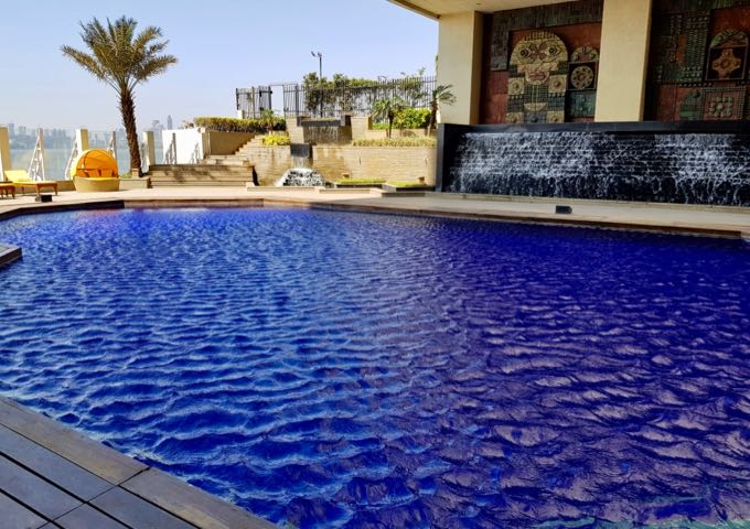 Bright blue swimming pool at The Oberoi.
