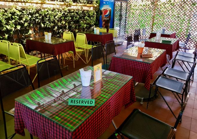 Tunga Bar & Restaurant offers garden-side seating.