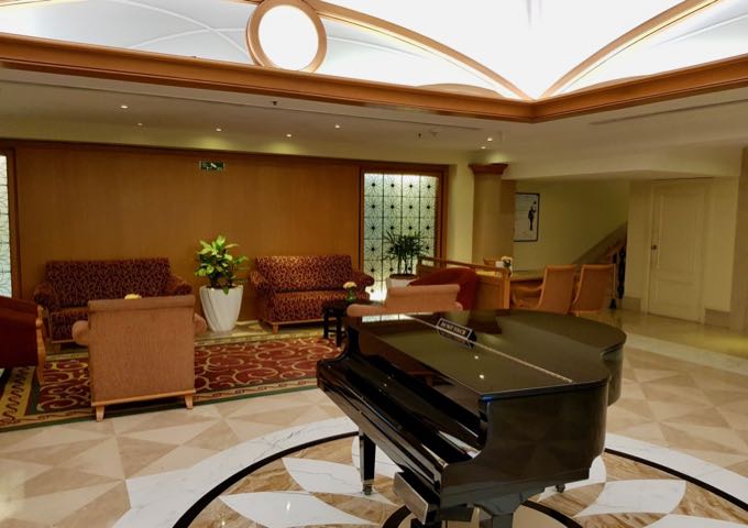 Grand piano in the hotel lobby.