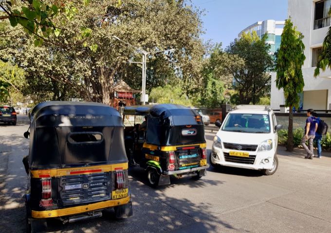 Auto-rickshaws outside the hotel.
