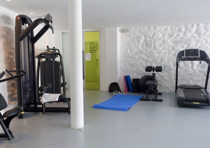 The gym oversees the beach and pool.