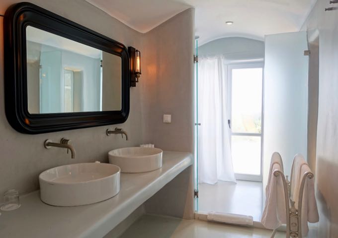 The suite's bathroom features dual vanities.