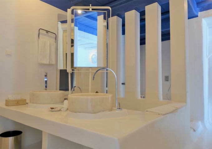 Each bathroom has dual vanities, shower, and tub.