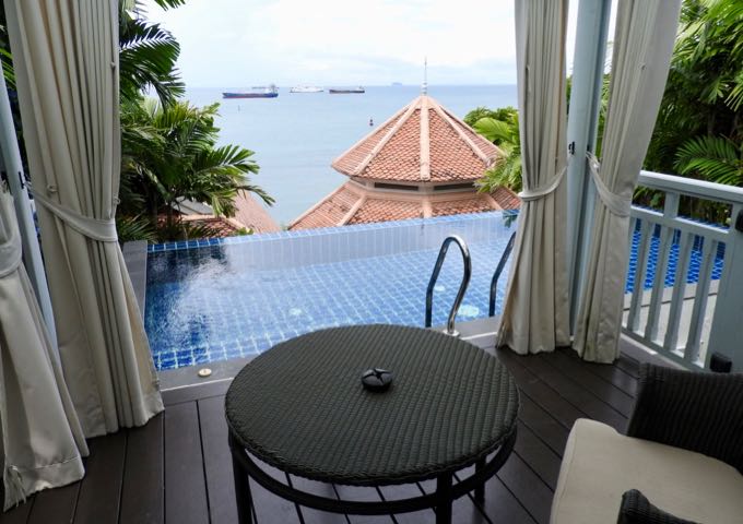 The Pool Pavilion's patio has an infinity pool and small outdoor sitting area.