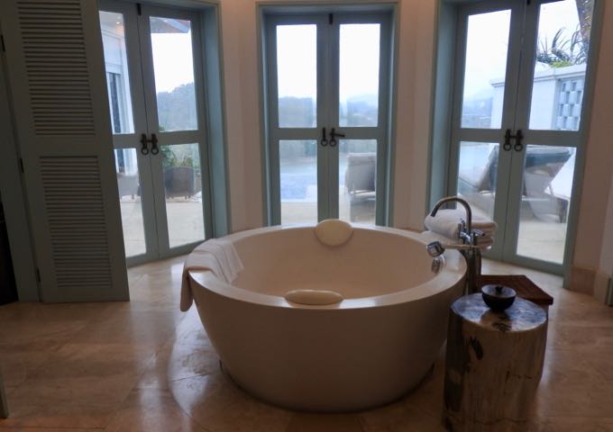 The giant round standalone bathtub offers excellent sea views.