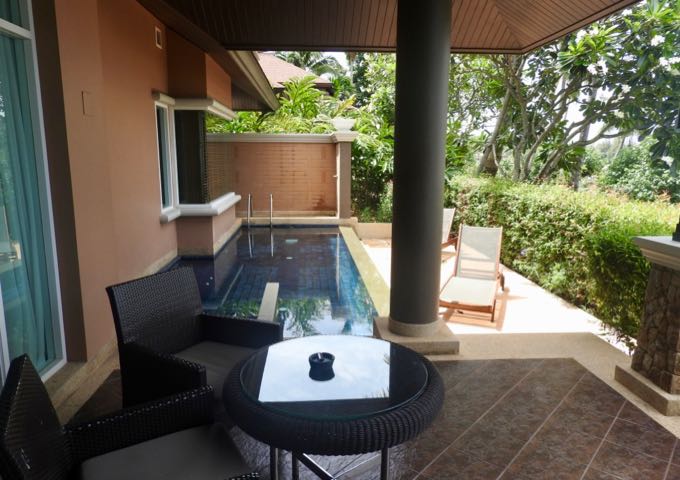 The outdoor porch has a big private pool with jacuzzi.