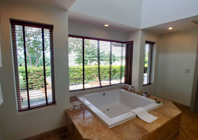 The bathroom is huge, and so is the bathtub.