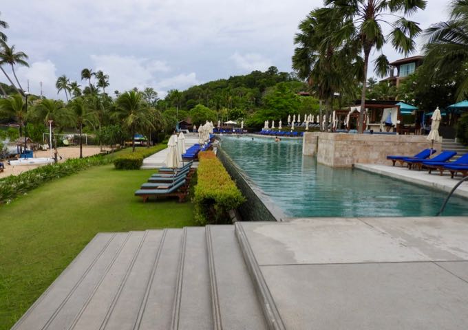 There are several sunbeds around the main pool.