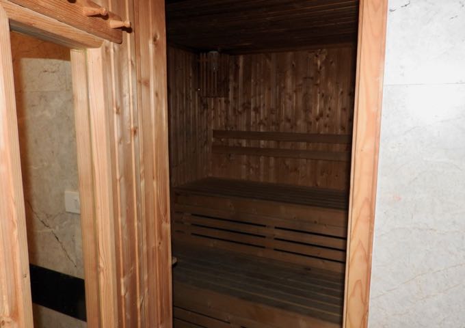 There are sauna rooms at the back of the gym.