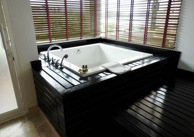 Each suite has a large bathtub with pool/sea views.
