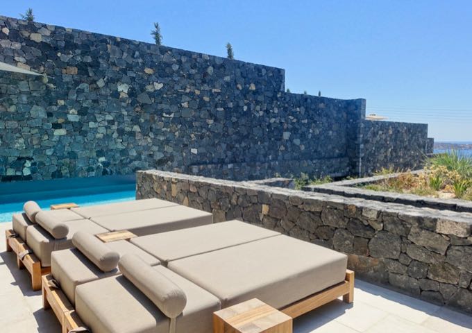 The terrace also features the pool and sun loungers.