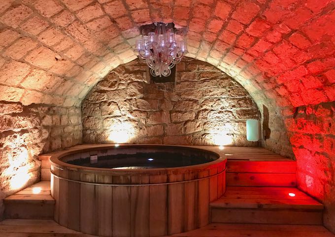The basement Spa 15 has a cedar wood hot tub.