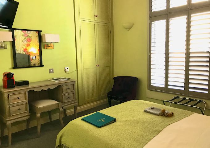 Individually styled rooms feature bold colors.