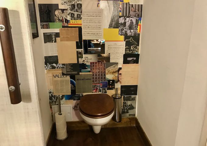 The Photo Room's bathroom features a collage.
