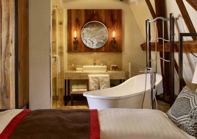 Some rooms feature free-standing tubs.