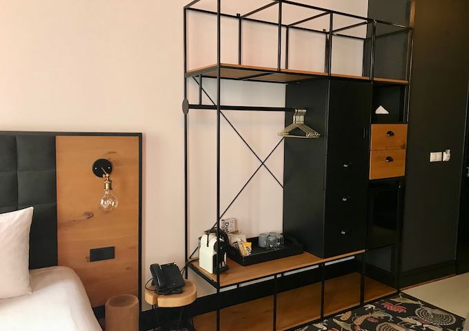 Many rooms feature open wardrobes.