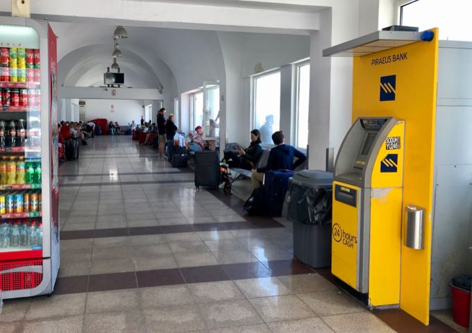 Passengers waiting in the passenger terminal at Santorini Ferry Port
