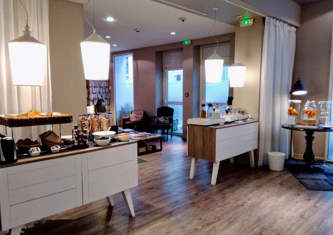 The lounge offers fresh coffee and citrus water.