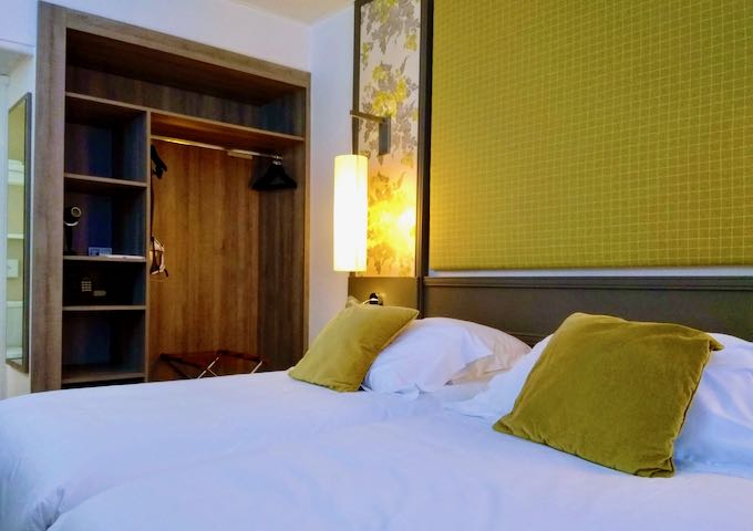 Superior Rooms feature wallpapers and dramatic headboards.