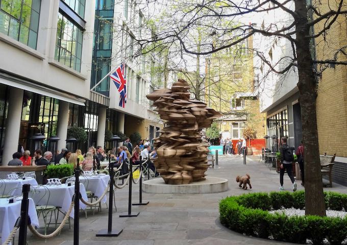 The entrance is marked with a huge Tony Cragg statue.