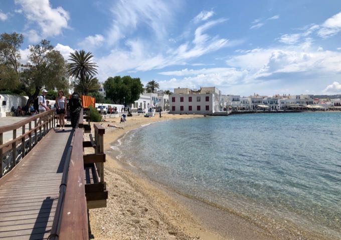 The wooden boardwalk that leads from Mykonos Old Port to the beach in Mykonos Town