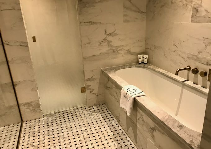 The spacious bathrooms are made of fine marble.