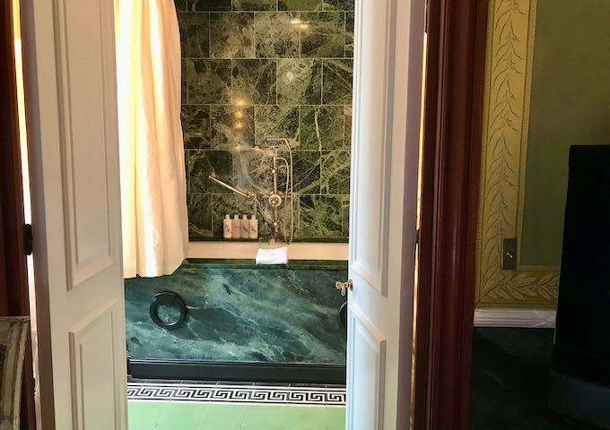 This bathroom features green marble.