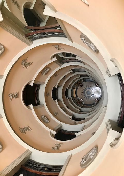 The round staircase is truly gorgeous.