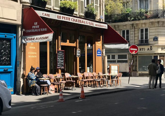 Le Petit Chateau d’Eau is great for beer, coffee, and meals.