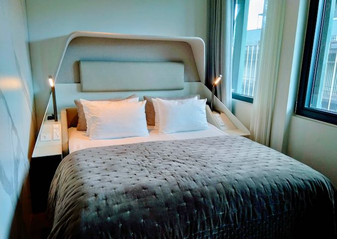 Standard Double rooms feature signature custom beds.