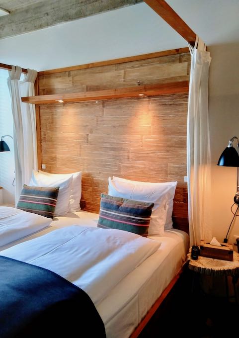 The Small Suites feature Guldsmeden signature four-poster beds.
