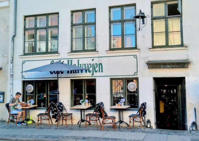 Café Halvvejen is a traditional pub serving beers, akvavit, and smørrebrod.
