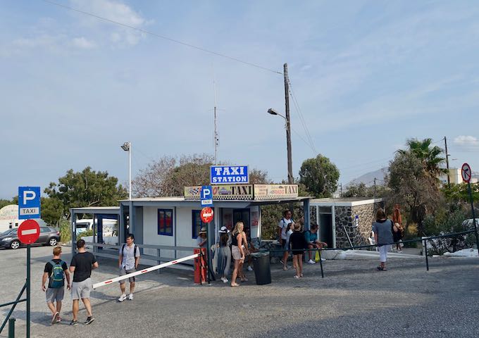 The taxi stand at the Fira bus station.