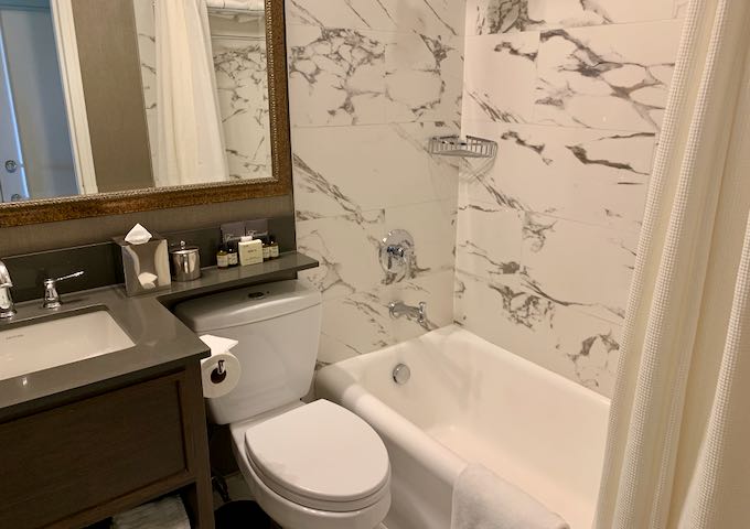 The Deluxe 2 Queen rooms have modern bathrooms.