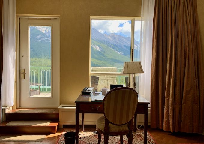 Rooms come with small writing desks.