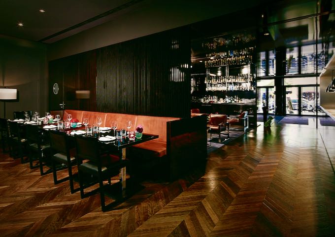 The lounge features a bar and dining area.