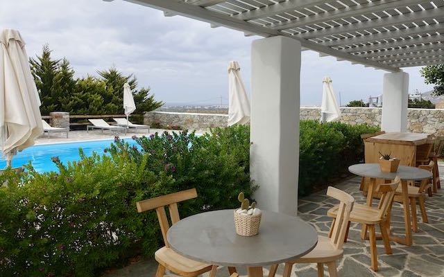 Pool and breakfast terrace at Seven Suites in Naxos