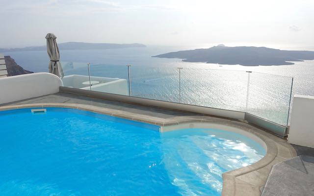 The pool and view at Noni's Apartments