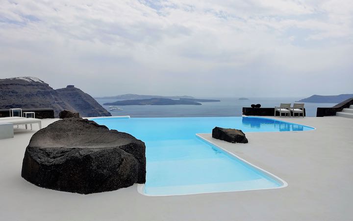 The main pool and caldera view at Aenaon Villas