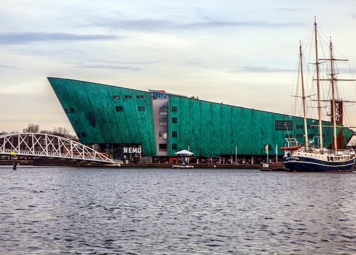 Green, ship-shaped exterior of NEMO museum in Amsterdam