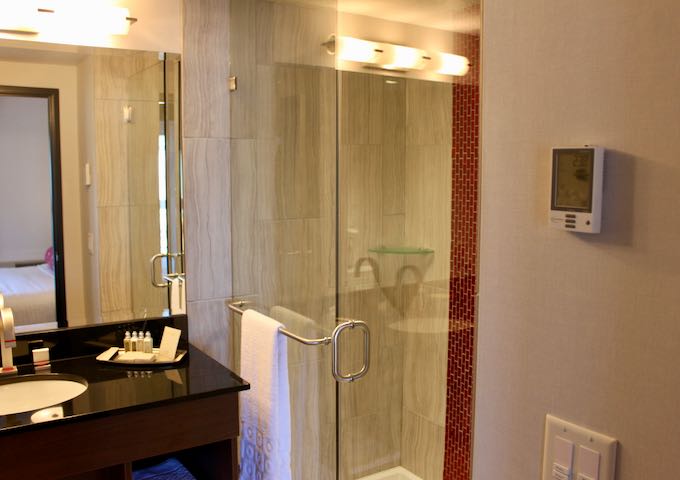 Bathrooms have shower cubicles.