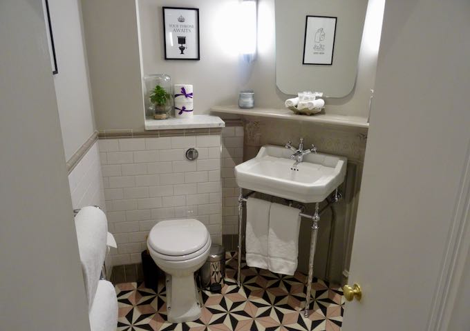 Bathroom are a fusion of period and modern decor.