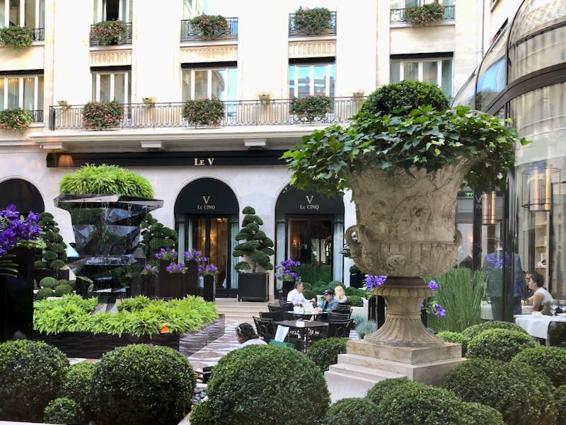 The courtyard of Le Cinq restaurant in the Four Seasons George V Hotel in Paris